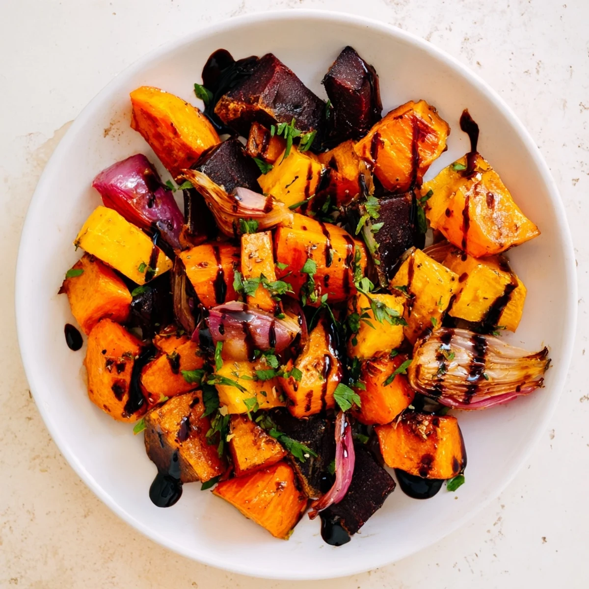 A beautiful close-up of the roasted root vegetable medley, highlighting the vibrant colors and flavors.