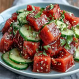 Juicy watermelon cucumber salad, lightly seasoned with lime and chili, incredibly refreshing.