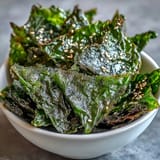 Oven-baked seaweed snack chips, a healthy, salty, and savory Asian-inspired treat.