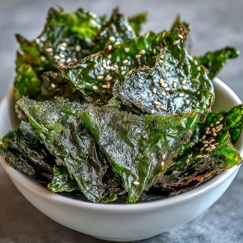 Oven-baked seaweed snack chips, a healthy, salty, and savory Asian-inspired treat.